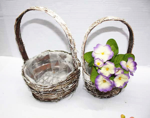 Birch bark single handle basket with snow