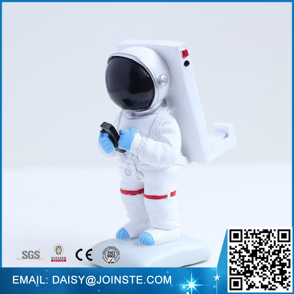 Spaceman cell phone holders for desk