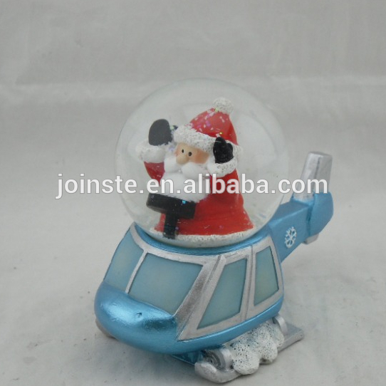 Custom resin Santa snow globe blue airplane base water globe decoration