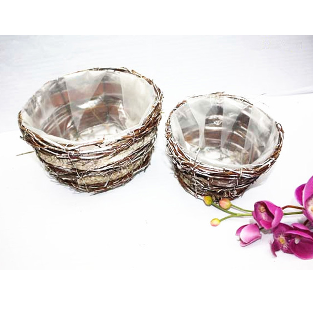 Birch bark single handle basket with snow