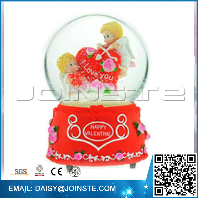 Wedding bear snow globe