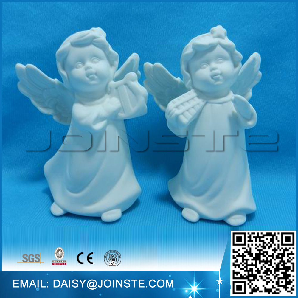 White porcelain angel figurine ceramic pottery