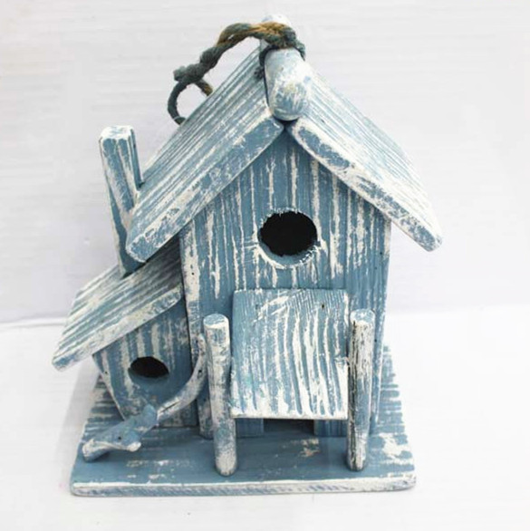 Primitive wooden blue birdhouse with two rooms