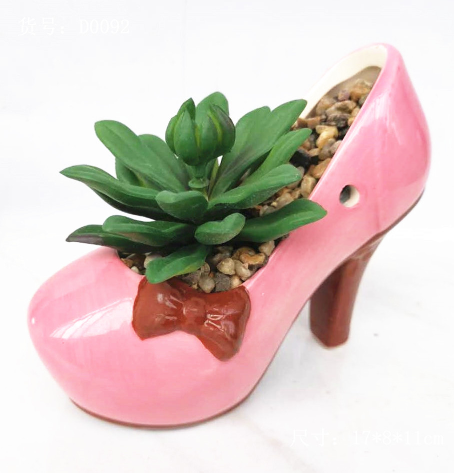Ceramic high-heeled shoes with artificial succulent potted