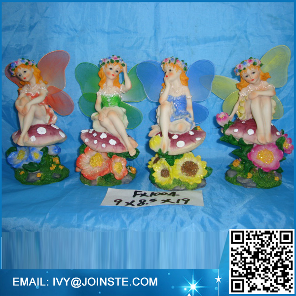 Cute flower fairy resin fairy figurine with wings siting on mushroom