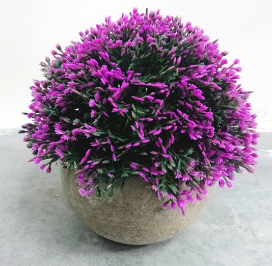 Artificial round ball shaped tropical blossom