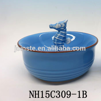 Cute blue ceramic bowl with seahorse inside
