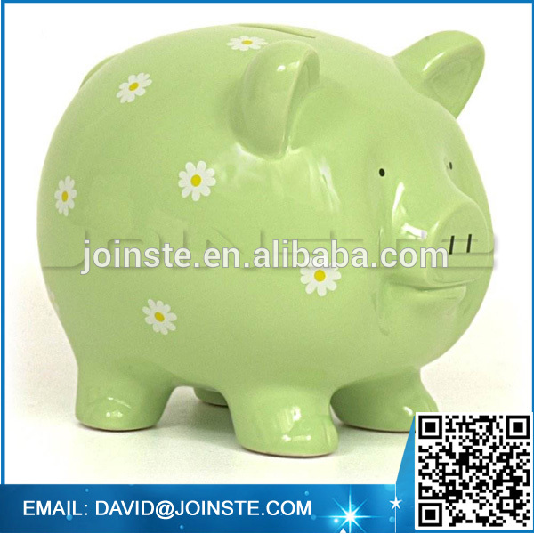 Ceramic piggy bank with coin counter