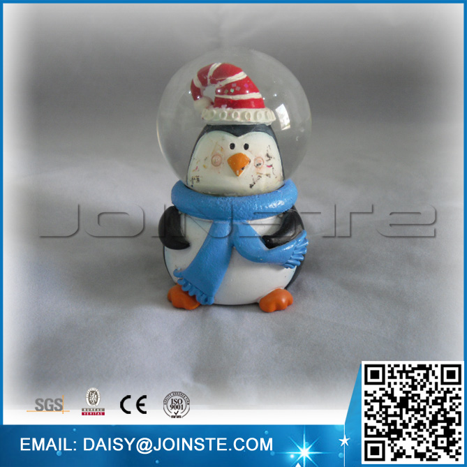 christmas penguin snow globe