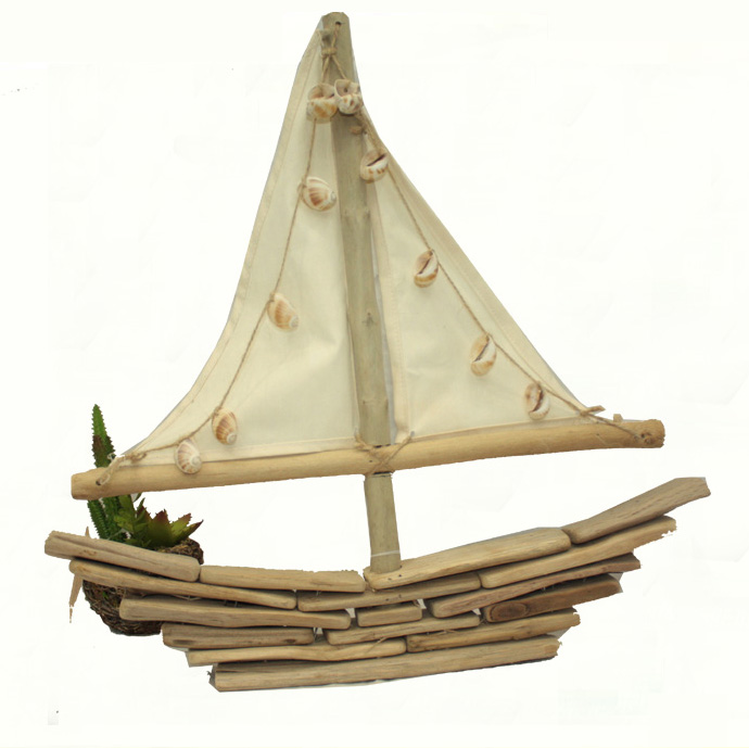 Natural driftwood sailling boat