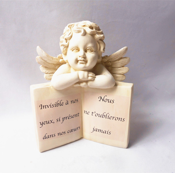 White polyresin   angel figurines with book