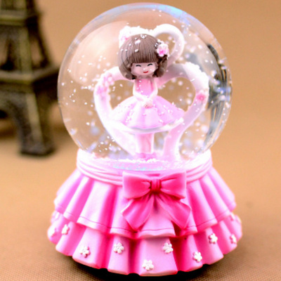 Custom cheap resin pink girl dancing snow globe water globe
