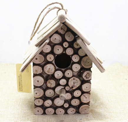 Small wooden firwood bark garden bird houses