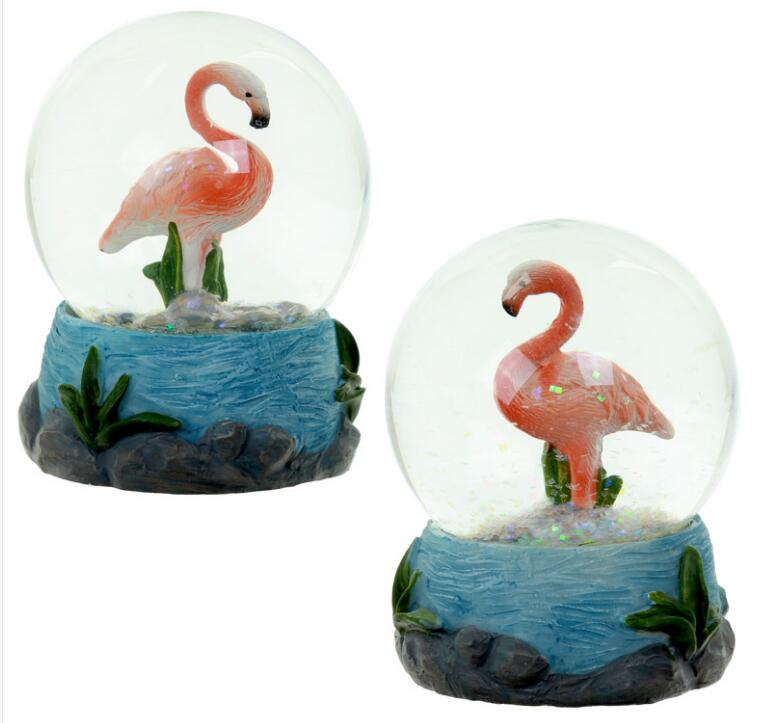 Customized polyresin pink flamingo water ball snow globes 80mm with 3D base