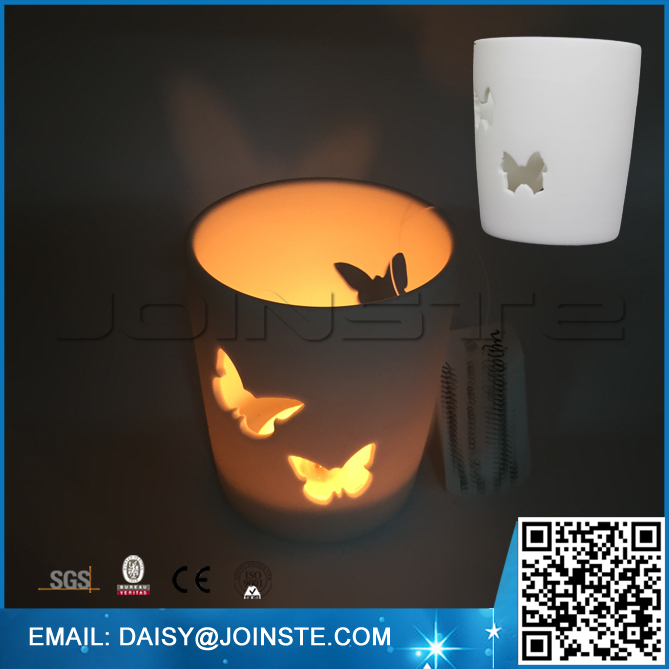 Hollowed butterfly porcelain tealight holders