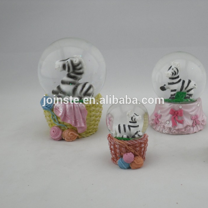 Custom resin zebra water globe with cute painting base cheap snow globe