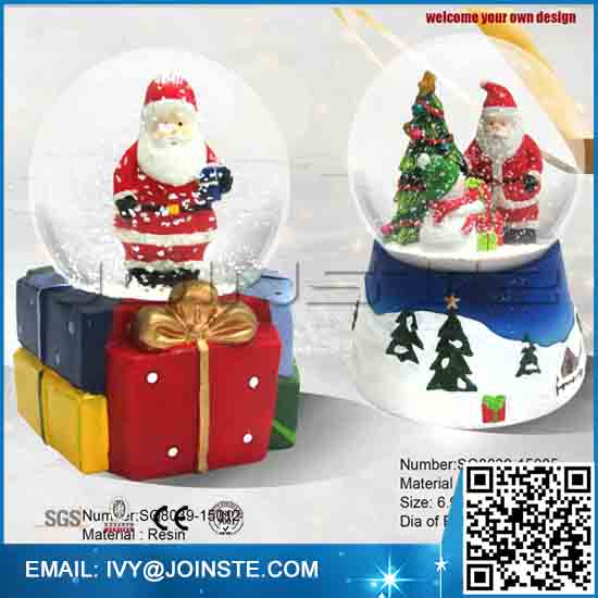 Christmas glass snow globe santa clause and snowman