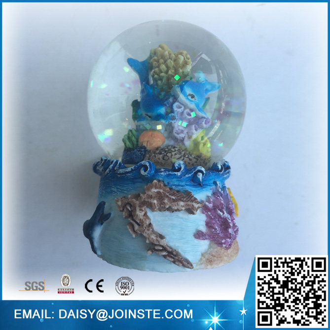 Blue dolphins snow globe souvenir