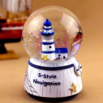 Custom hot sale 80mm European style resin snow globe with glitter and music