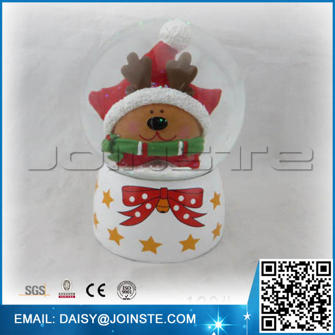 Musical Reindeer head with bow tie draw 100mm water globe