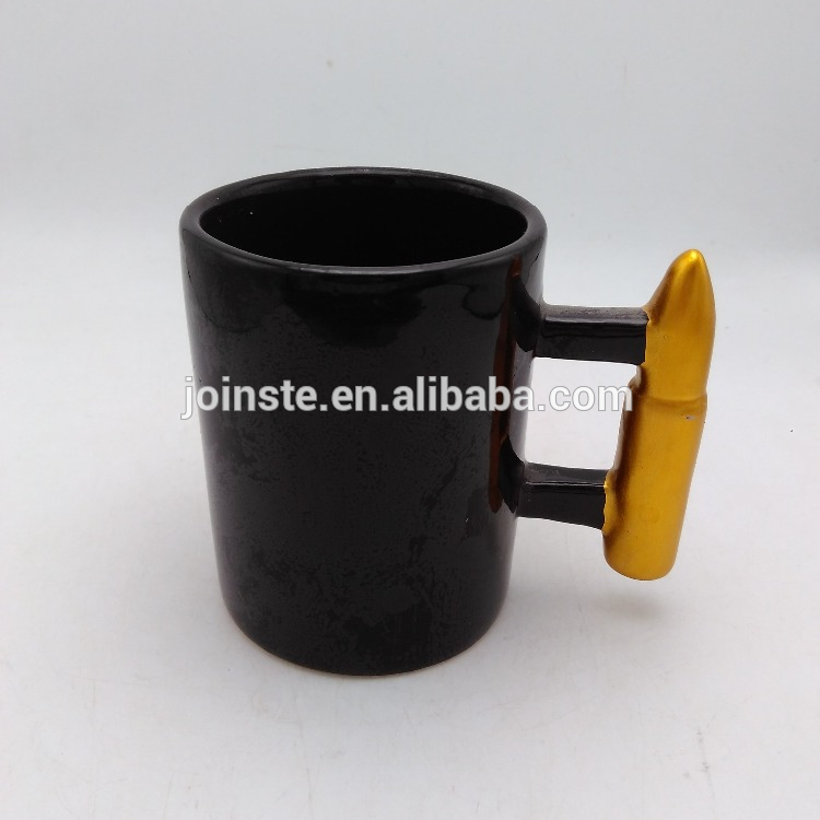 Gold bullet handle Black ceramic mug